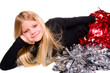 Cheerleader resting on elbow laying down with pom-pom