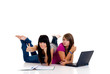 Teenager girls studying with computer and books