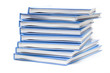 stack of books with blue covers isolated on white