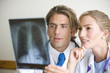 Doctors checking a chest xray at the hospital.