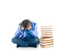 Teenager schoolboy with books on white background