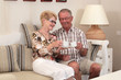 Happy seniors having a cup of tea together