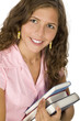 Young woman holding books