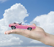 A hand whit pink car gift A hand whit pink car gift