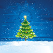 green christmas tree in th dark night