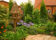 Quaint English Cottage Garden With Chapel In the Background