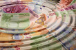 illustration of european banknotes with round water waves illustration of european banknotes with round water waves