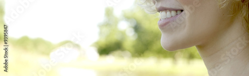 Photo of young Caucasian womanÕs mouth smiling. Photo of young Caucasian womanÕs mouth smiling.