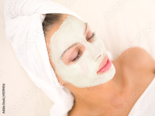 Photo: Portrait of beautiful woman during spa treatment Portrait of beautiful woman during spa treatment