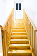 Yellow ladder going upstairs