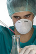 Scientist taking a probe in a labor scene with testtubes