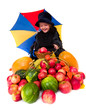 little girl in the witch costume with halloween harvest