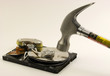 Photo: Computer hard disk destroyed by hammer Computer hard disk destroyed by hammer