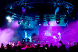 People dancing at the concert, laser show and music