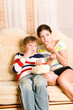 Girls and the boy on sofa