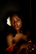 A young african american girl, photographed in the studio.