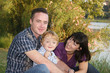 Family with a little son at nature