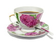 Porcelain cup to tea, a saucer and a spoon. Isolated.