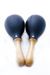 Pair of black plastic maracas isolated on white