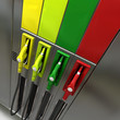 3D rendering of four brightly colored gas pumps 3