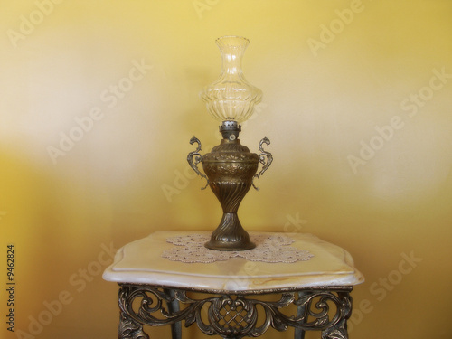 Photo: close up shot of an antique lamp close up shot of an antique lamp