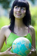 Foto: beautiful brunet woman with global beautiful brunet woman with global