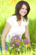 laughing girl with bunch on grass