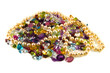 A large group of mixed faceted gemstones with pearls .