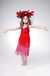 Gorgeous little girl in red Halloween dress.