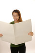 beautiful young lady is reading blank paper