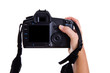 Hand holding digital photo camera