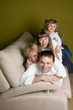 Happy family together on sofa
