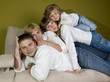 Happy family on sofa