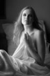 Sensual naked young blonde adult Caucasian woman