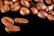Coffee at black. Perfect coffee grains. High detail