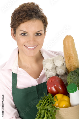 Photo: Woman holding grocery bag Woman holding grocery bag