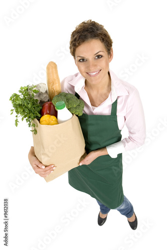 Photo: Shop Assistant Holding Grocery Bag Shop Assistant Holding Grocery Bag