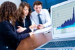 In background happy young business people having meeting In background happy young business people having meeting