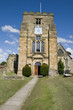 Foto: A rural church with clock tower and blue sky A rural church with clock tower and blue sky