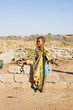 african boy living in a very poor community