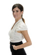 glamorous woman putting her hand in pocket agains