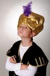 An elder sultan or sheik with a sword isolated over black An elder sultan or sheik with a sword isolated over black