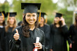 Foto: graduation girl holding her diploma with pride graduation girl holding her diploma with pride