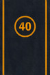 Yellow 40 limit speed caution marking on asphalt pavement Yellow 40 limit speed caution marking on asphalt pavement