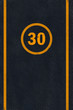 Yellow 30 limit speed caution marking on asphalt pavement Yellow 30 limit speed caution marking on asphalt pavement