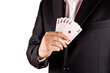 Business man with card and he has an ace up his sleeve