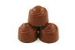 Pyramid from chocolate candies on a white background