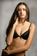 woman in underwear on gray background