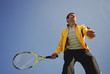 player in tennis on blue background sky iin sunny day