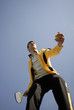 player in tennis on blue background sky iin sunny day